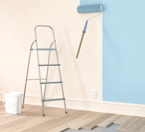 blue paint roller and ladder